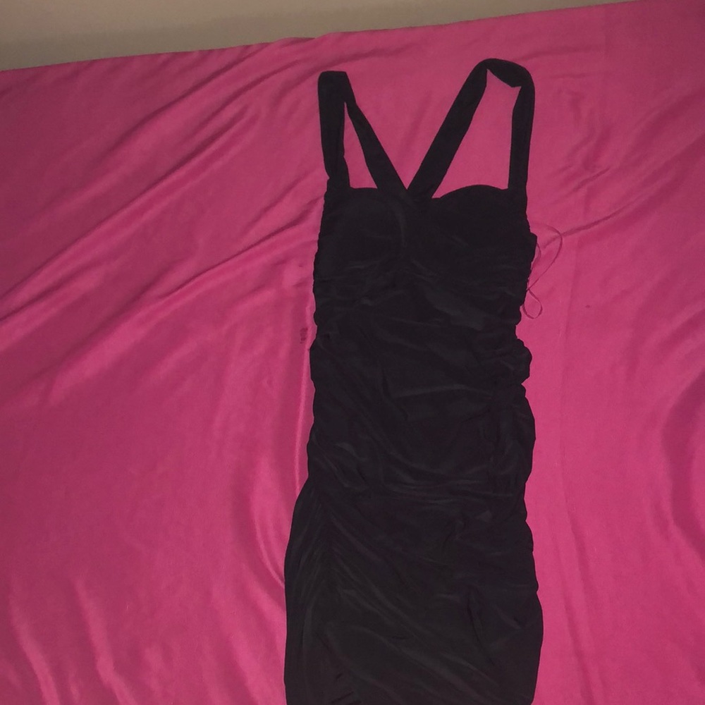 Brand is from sabora, it’s a black XS dress.